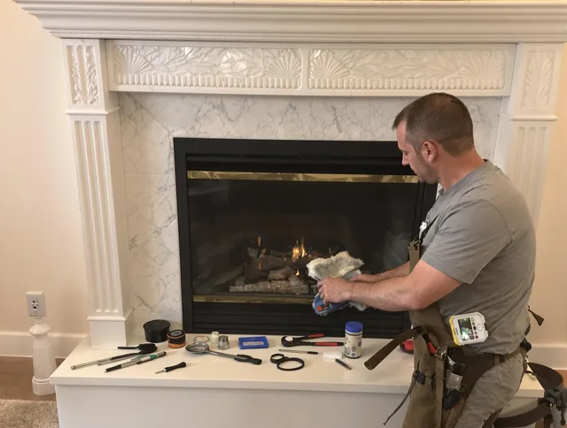 Jerome Chimney Sweep performing fireplace maintenance in Jerome, OH