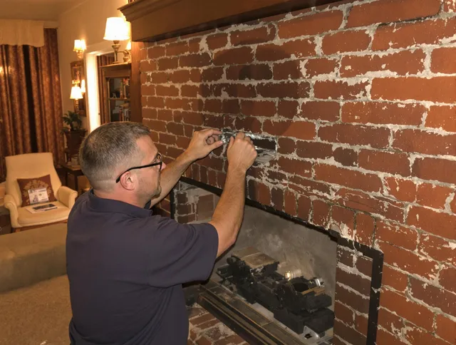 Jerome Chimney Sweep expert fixing a fireplace in Jerome, OH